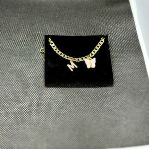 Gold M Initial anklet with butter fly charm